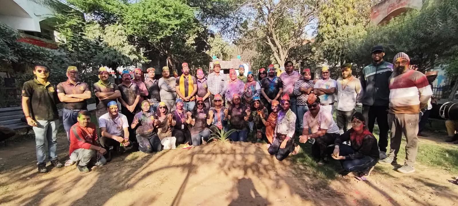 Colorful Holi festival celebration with people playing with gulal and water in India