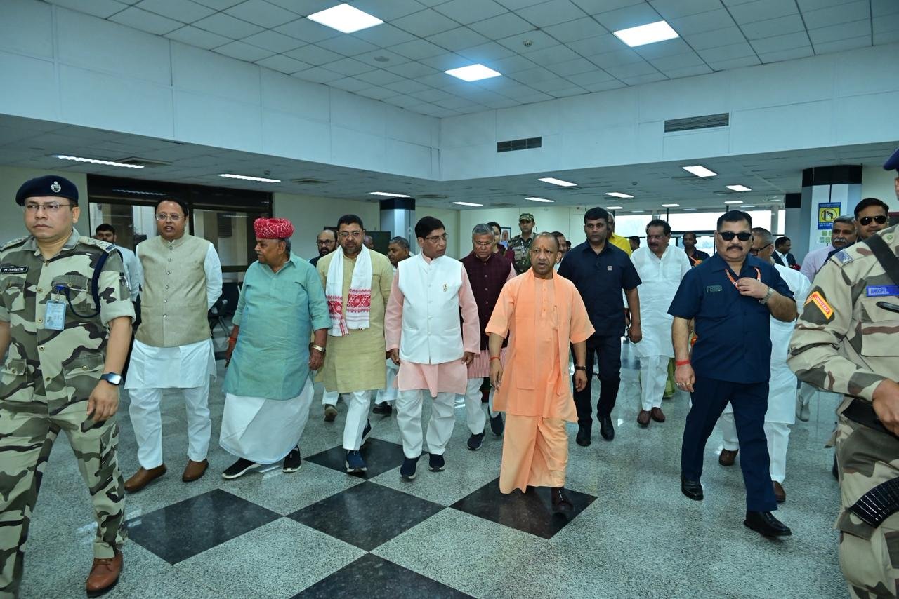 Uttar Pradesh Chief Minister Yogi Adityanath visiting Agra for an official event, interacting with dignitaries and the public.