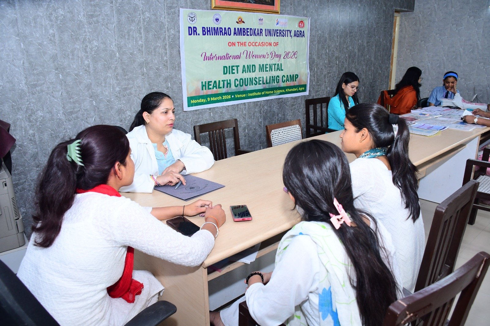 Students attending free nutrition and mental health counseling camp at Dr. Bhimrao Ambedkar University, Agra on International Women’s Day
