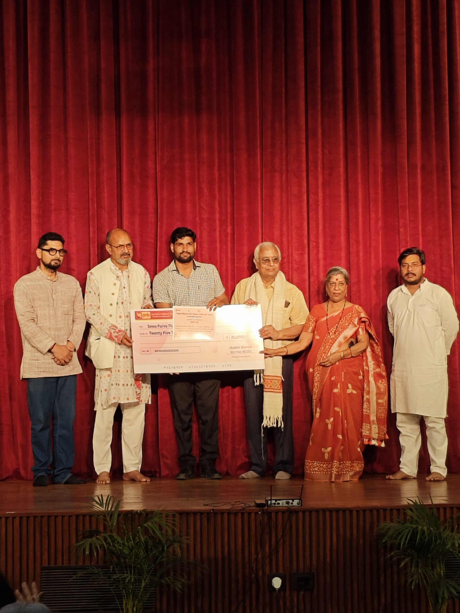 Students of Dr. Bhimrao Ambedkar University Agra receiving awards at Virasat Kala Utsav painting competition organized by North Central Zone Cultural Centre