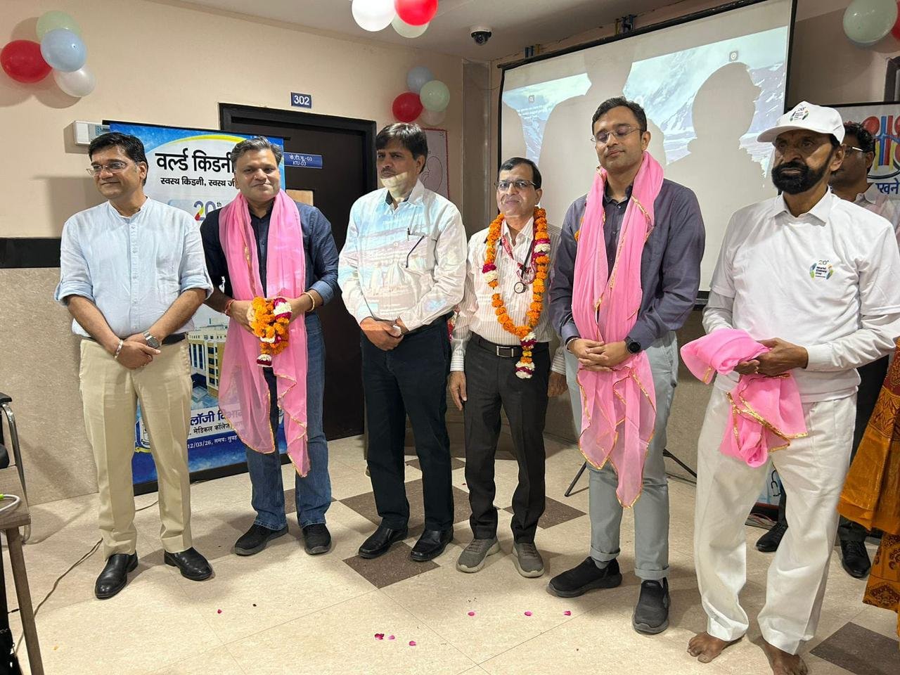Doctors addressing patients during World Kidney Day awareness program at SN Medical College Agra