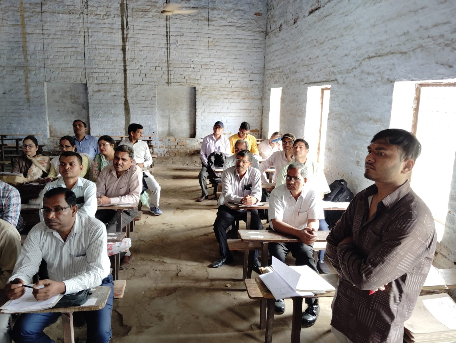 Examiners and DHE undergoing training at RBS Inter College for UP Board 2026 answer sheet evaluation