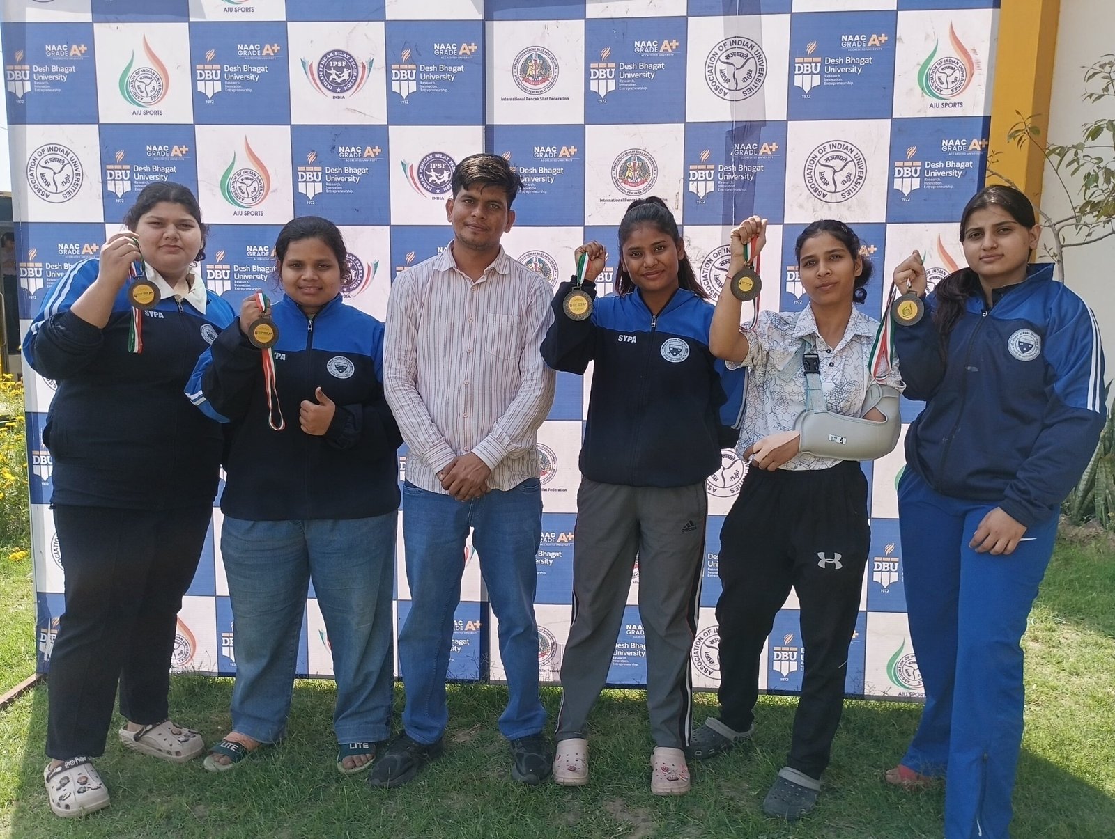 DBRAU students celebrating after winning bronze medals in National Penchak Silat Championship in Punjab