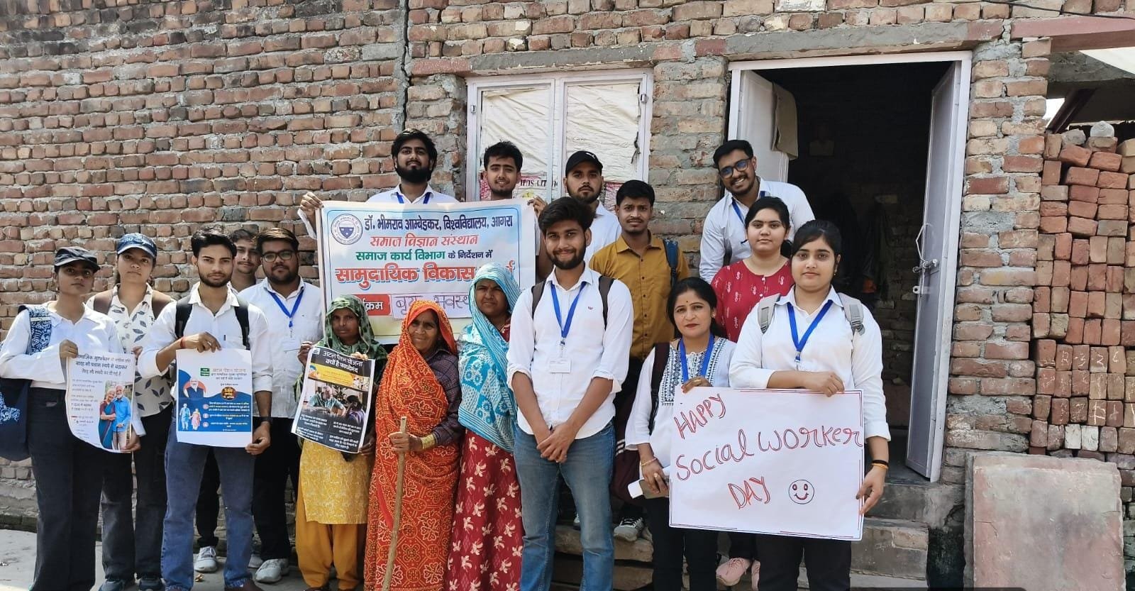 Students of Social Work Department at Dr. B.R. Ambedkar University Agra conducting awareness rally in Midha Kur village educating people about old age pension and child labour elimination
