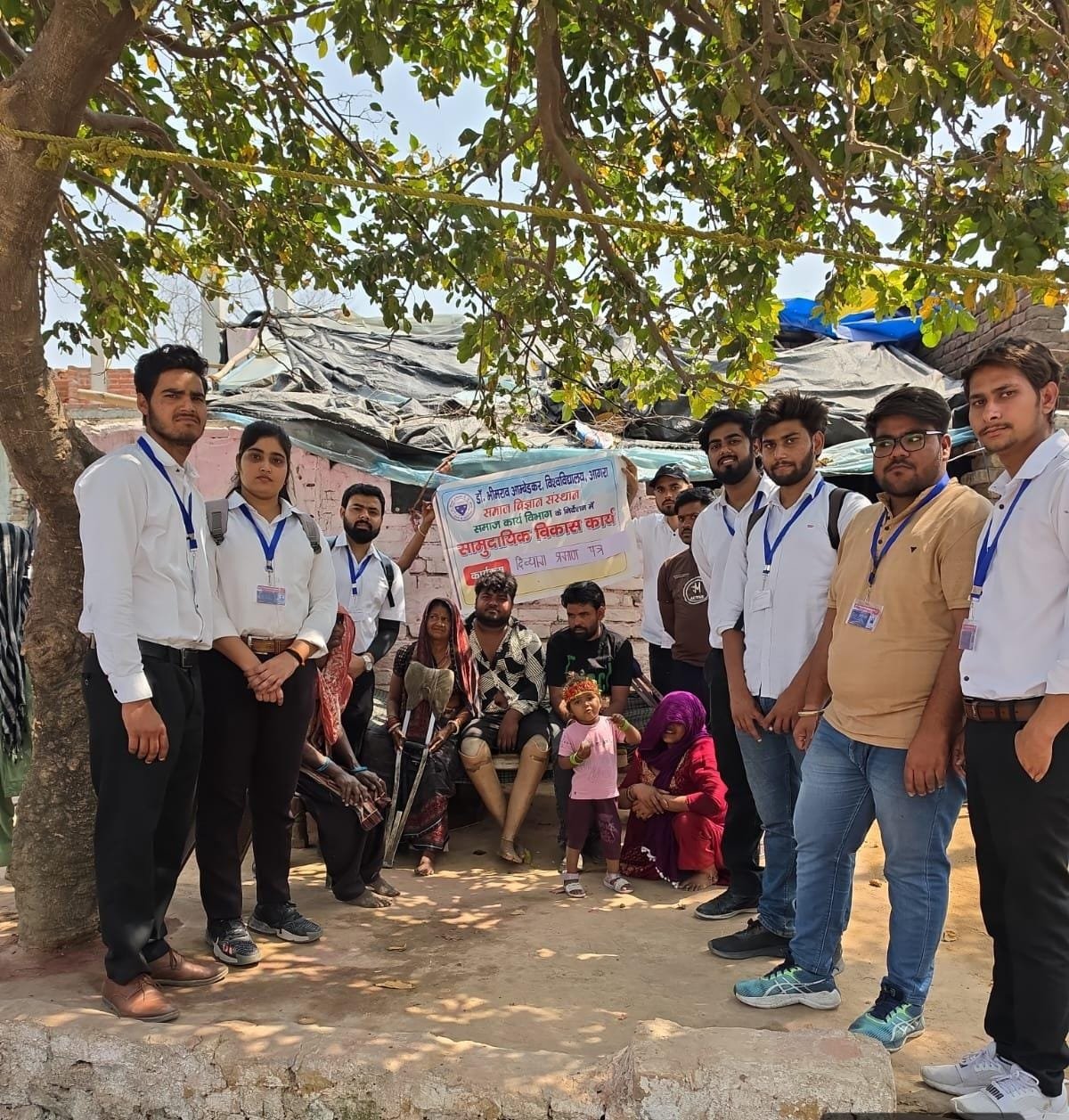 Students of Dr Bhimrao Ambedkar University Agra spreading awareness about disability rights and voting in Midhaakur village