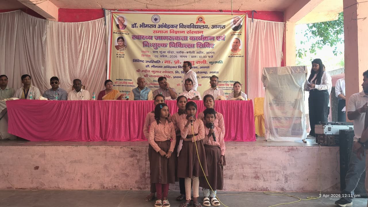 Doctors providing free health checkups to villagers during medical camp in Kuan Khera village Agra