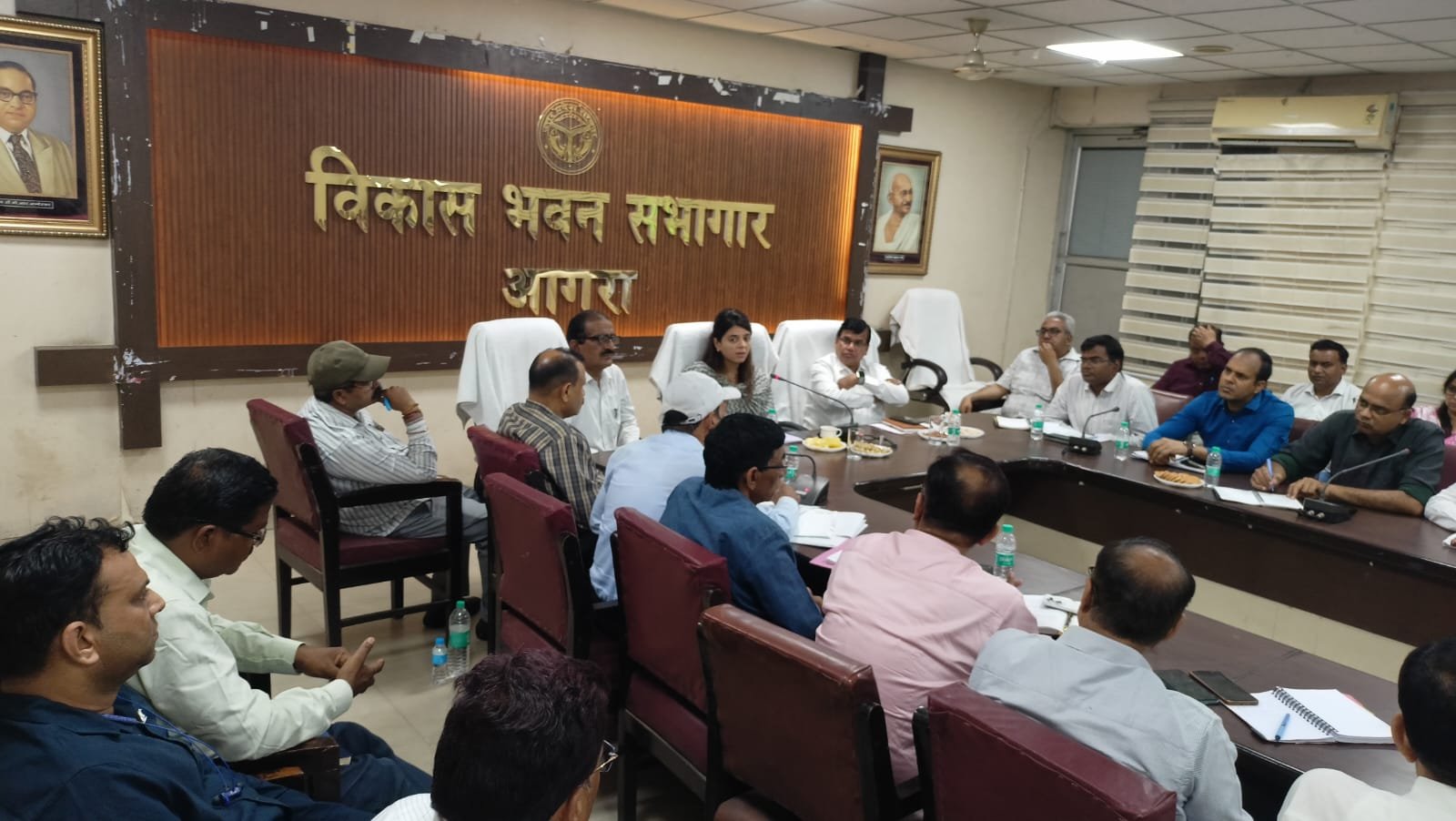 Officials reviewing cattle shelters and livestock management at Development Bhawan.