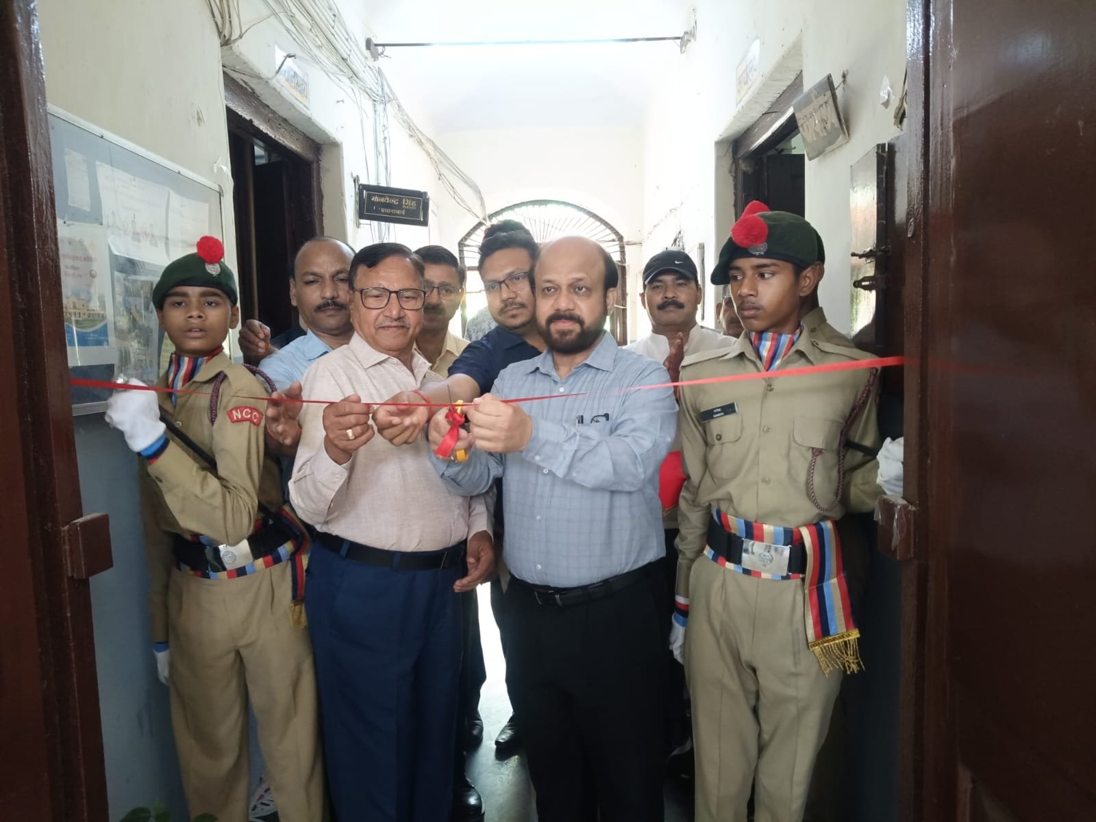 “Dr. Mukesh Agrawal, Joint Director of Education, inaugurating the Book Awareness and Accessibility Camp by cutting the ribbon at Rajkiya Inter College, Agra.”