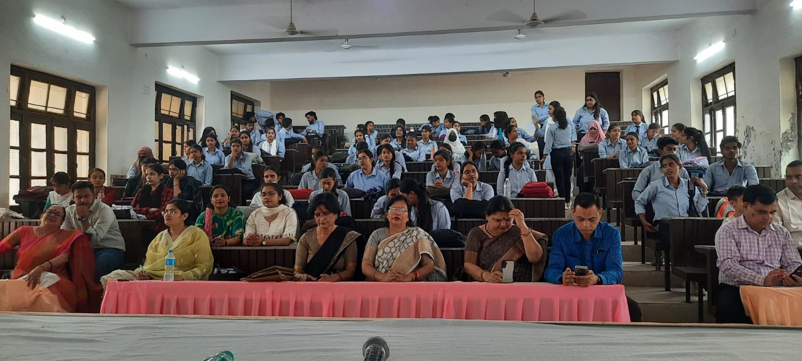 Female students and teachers attentively participating in Bioinformatics and Artificial Intelligence workshop at Agra College Agra