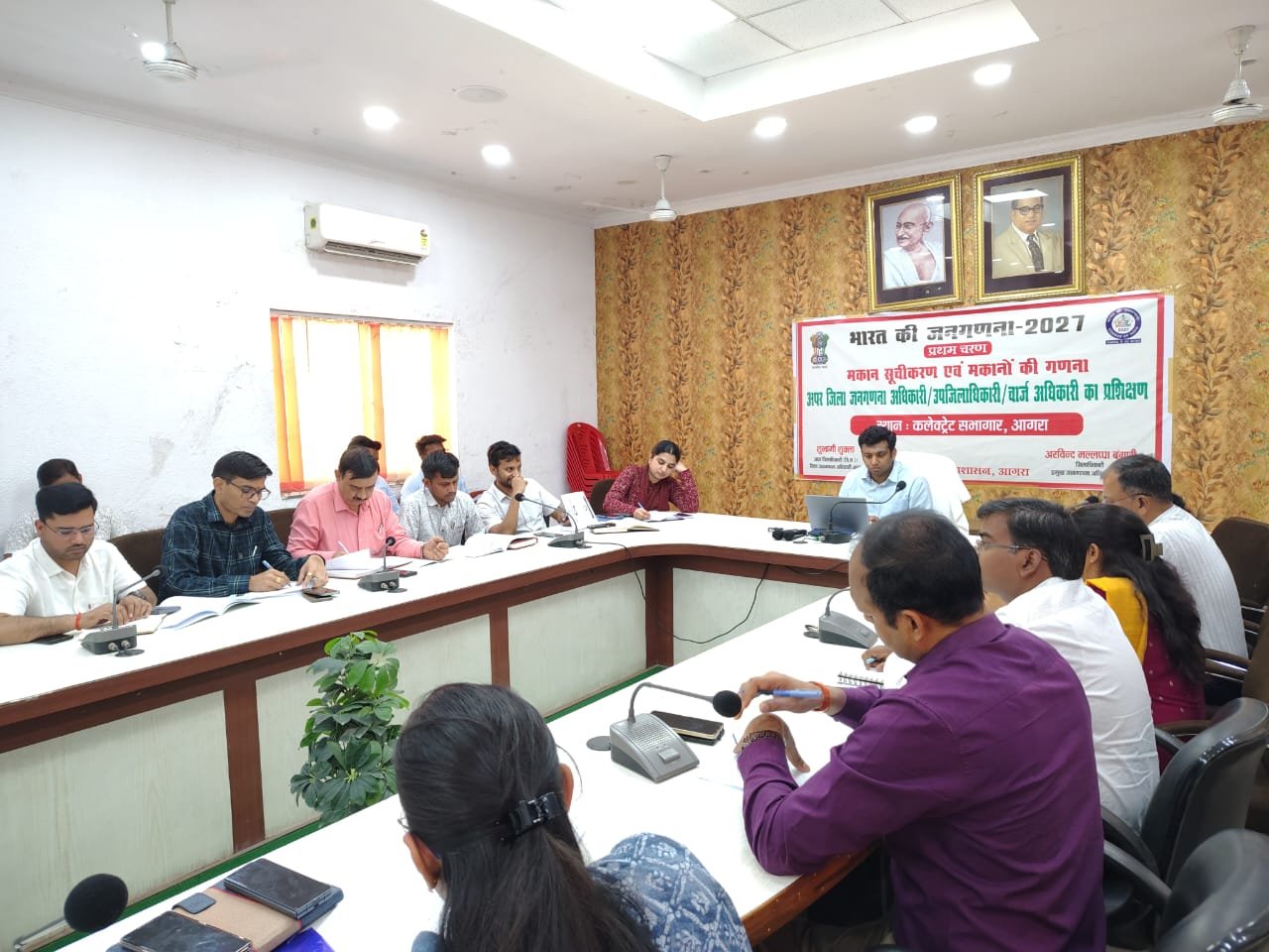Training session of census 2027 officials in Agra with district authorities and supervisors preparing for fully digital household enumeration and self-census portal launch.