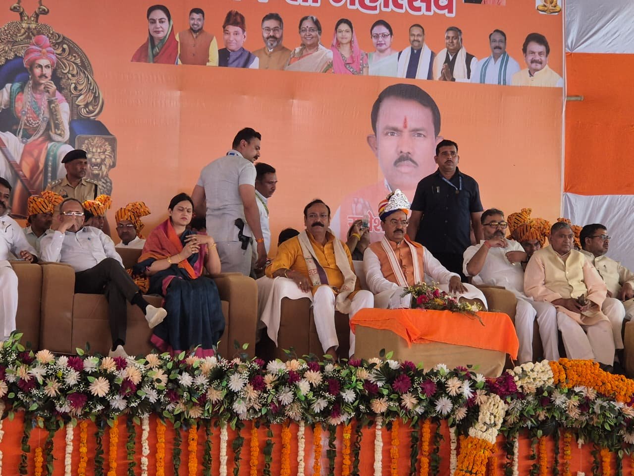 Deputy Chief Minister Keshav Prasad Maurya sitting on stage with Anil during an official public program