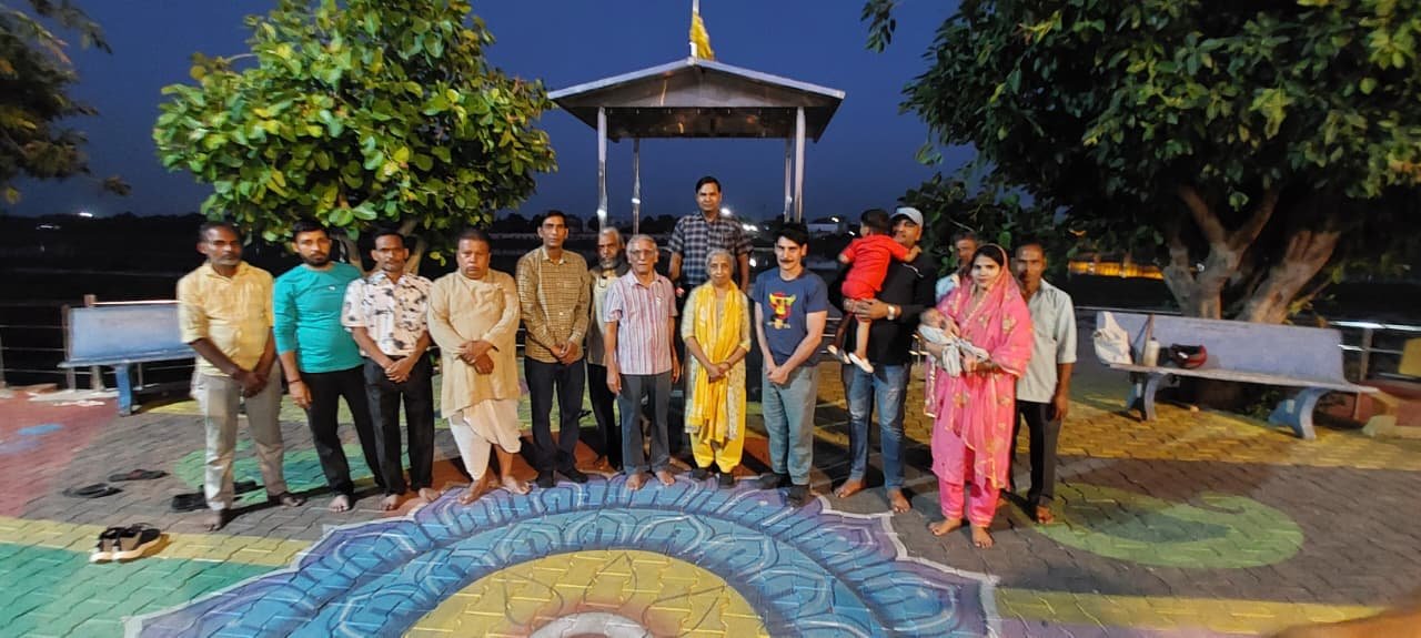 River Connect Campaign members standing during a public environmental discussion meeting in Agra.