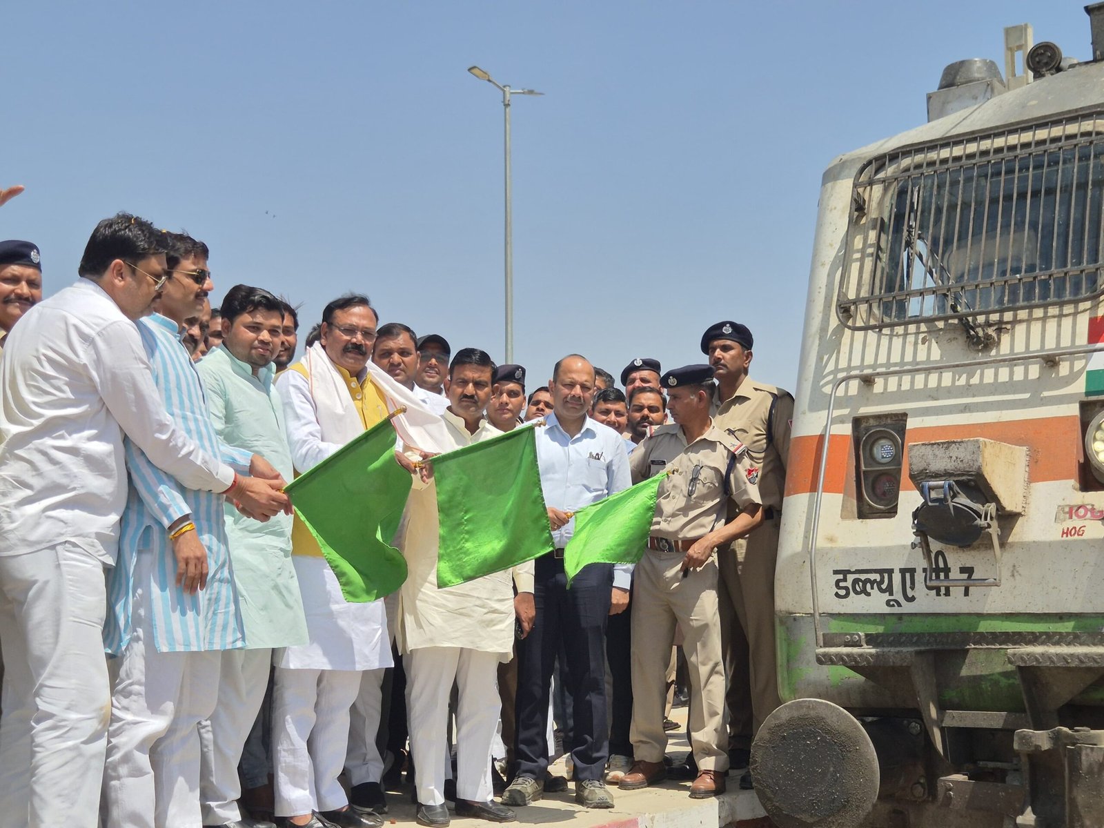 MP Rajkumar Chahar and DRM Agra jointly flagging off new weekly summer special train at Fatehabad railway station in Agra