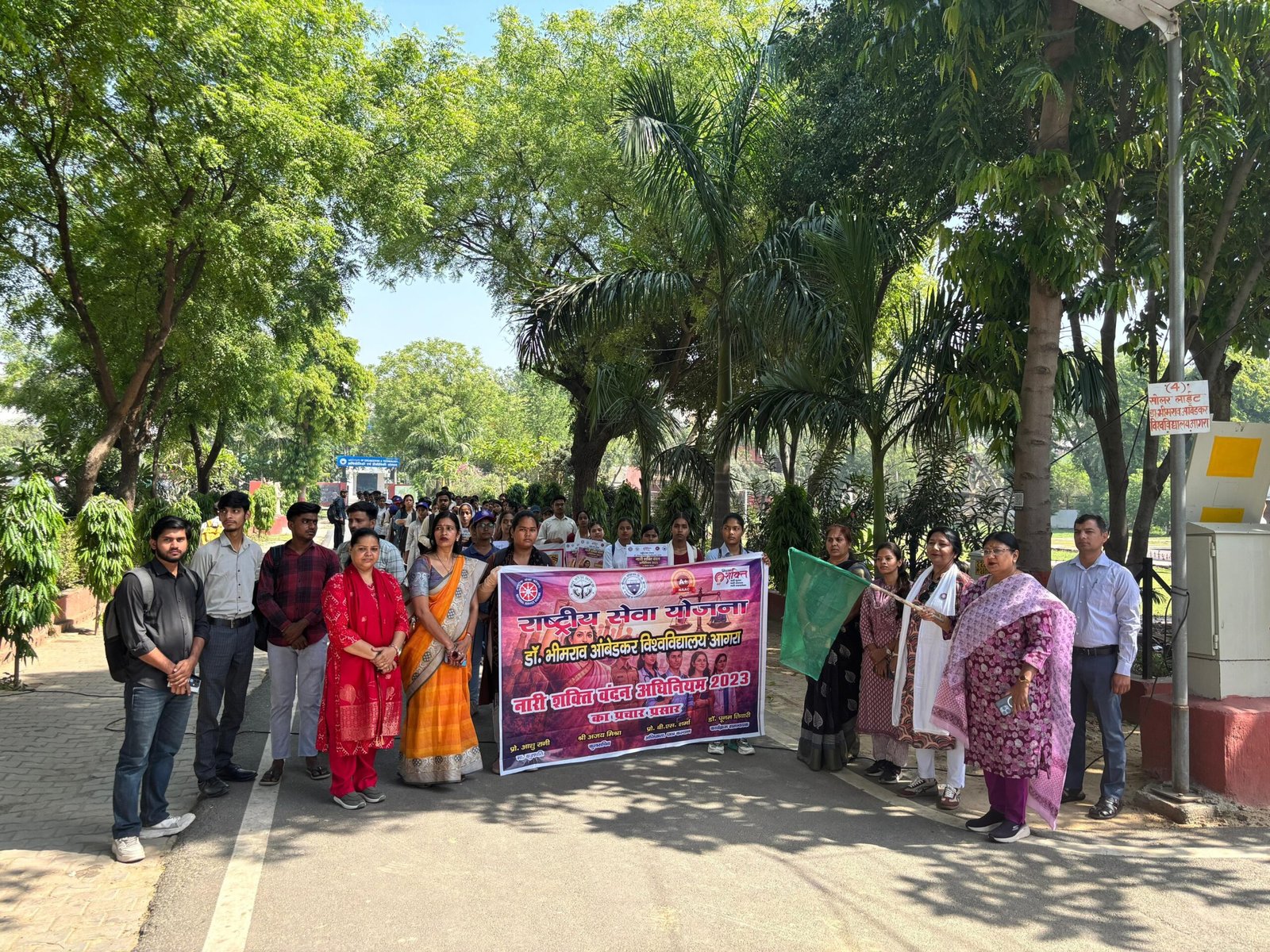 Students and NSS volunteers participating in awareness rally, human chain, and street play on Nari Shakti Vandan Adhiniyam 2023 at Dr. Bhimrao Ambedkar University Agra