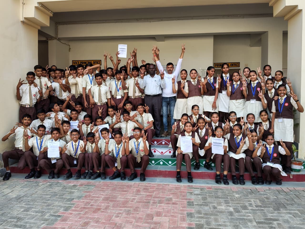 Students of Atal Residential School Agra celebrating 100 percent CBSE Class 10 result with topper Ganesh Kumar achievement