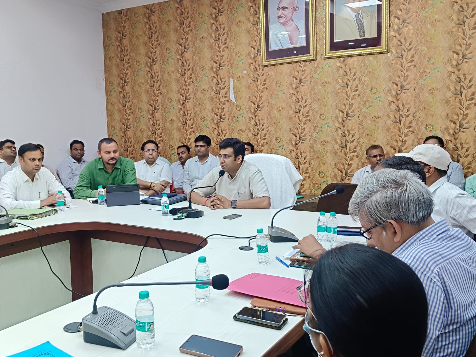 District Magistrate Arvind Mallappa Bangari chairing IGRS portal review meeting with officials in Agra Collectorate Auditorium discussing grievance redressal and complaint disposal system