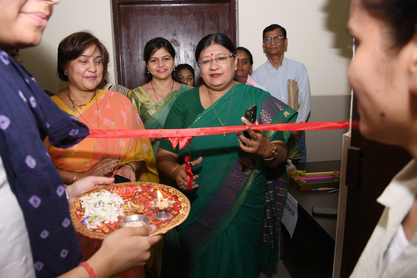 Students displaying handmade products at Hunar Haat exhibition and sale event in Dr. Bhimrao Ambedkar University Agra.