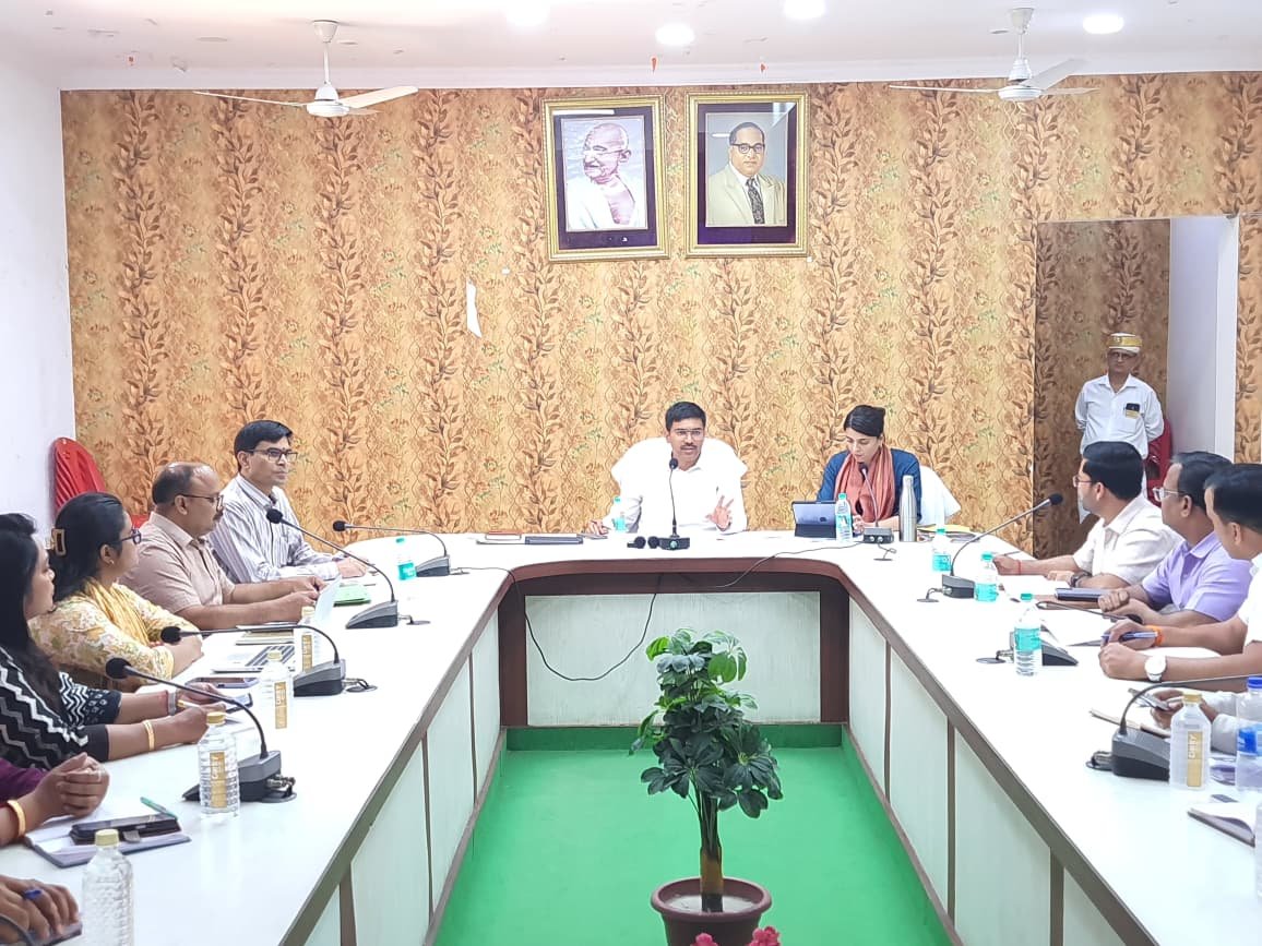 District Magistrate Manish Bansal chairing a review meeting with officials at the Collectorate auditorium in Agra regarding the District Task Force (DTF) of the Basic Education Department.