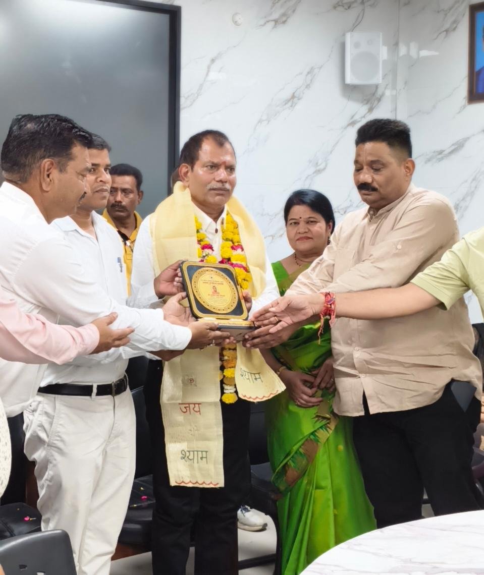 University staff and officials attending farewell ceremony of Gyanesh Tiwari at Dr. Bhimrao Ambedkar University Agra