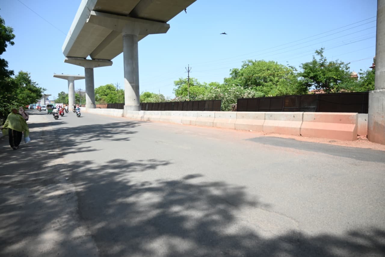 Barricades being removed on MG Road in Agra as metro construction progresses and new roads are developed to ease traffic congestion