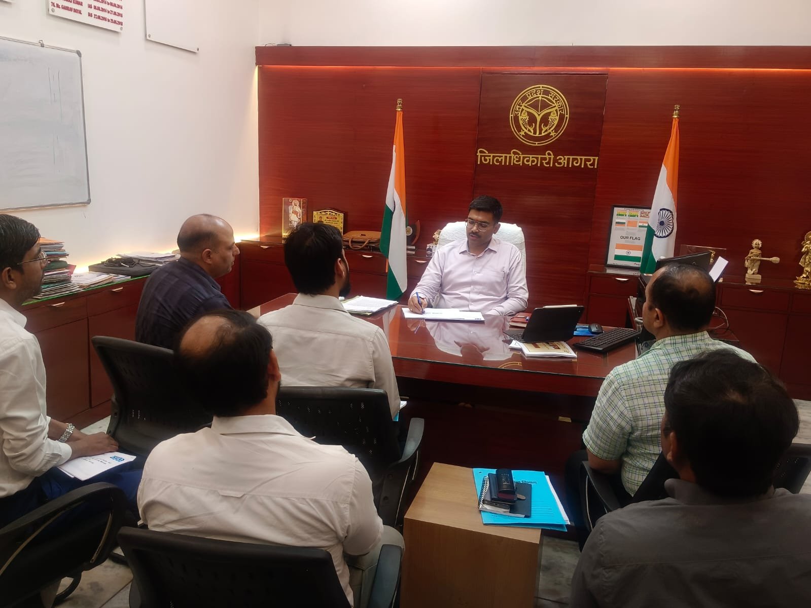 District Magistrate Manish Bansal reviewing Agra water supply and sewerage projects with officials during a presentation