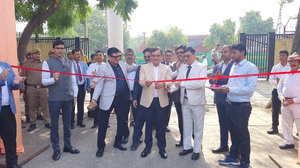 District Judge Sanjay Kumar Malik inaugurating National Lok Adalat by cutting ribbon in Agra court premises