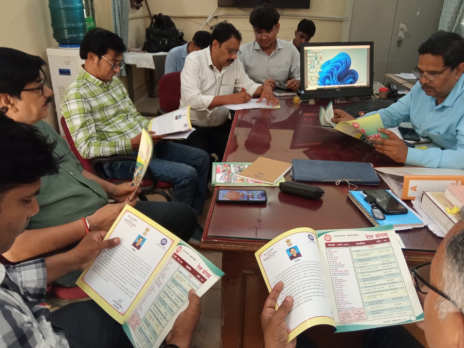 Officials and supervisors attending Rajbhasha Hindi meeting at Tank Wagon Depot Bad discussing promotion of Hindi in official railway work