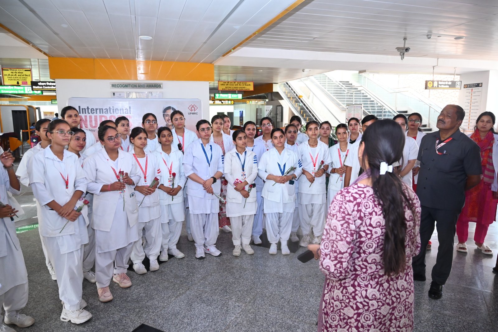 Nursing students and staff during Agra Metro’s special ride at Taj East Gate Metro Station on International Nurses Day