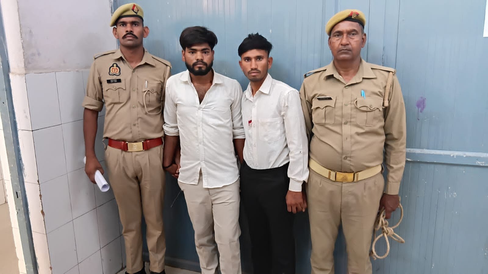 Police team arresting accused involved in gas agency firing incident with illegal pistol and cartridges recovered