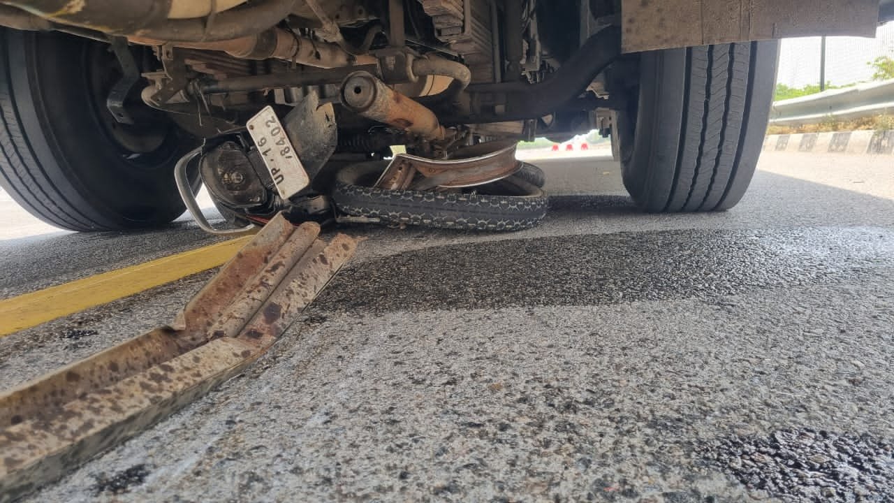 Bike trapped under speeding double decker bus after fatal accident on Agra-Lucknow Expressway in Fatehabad