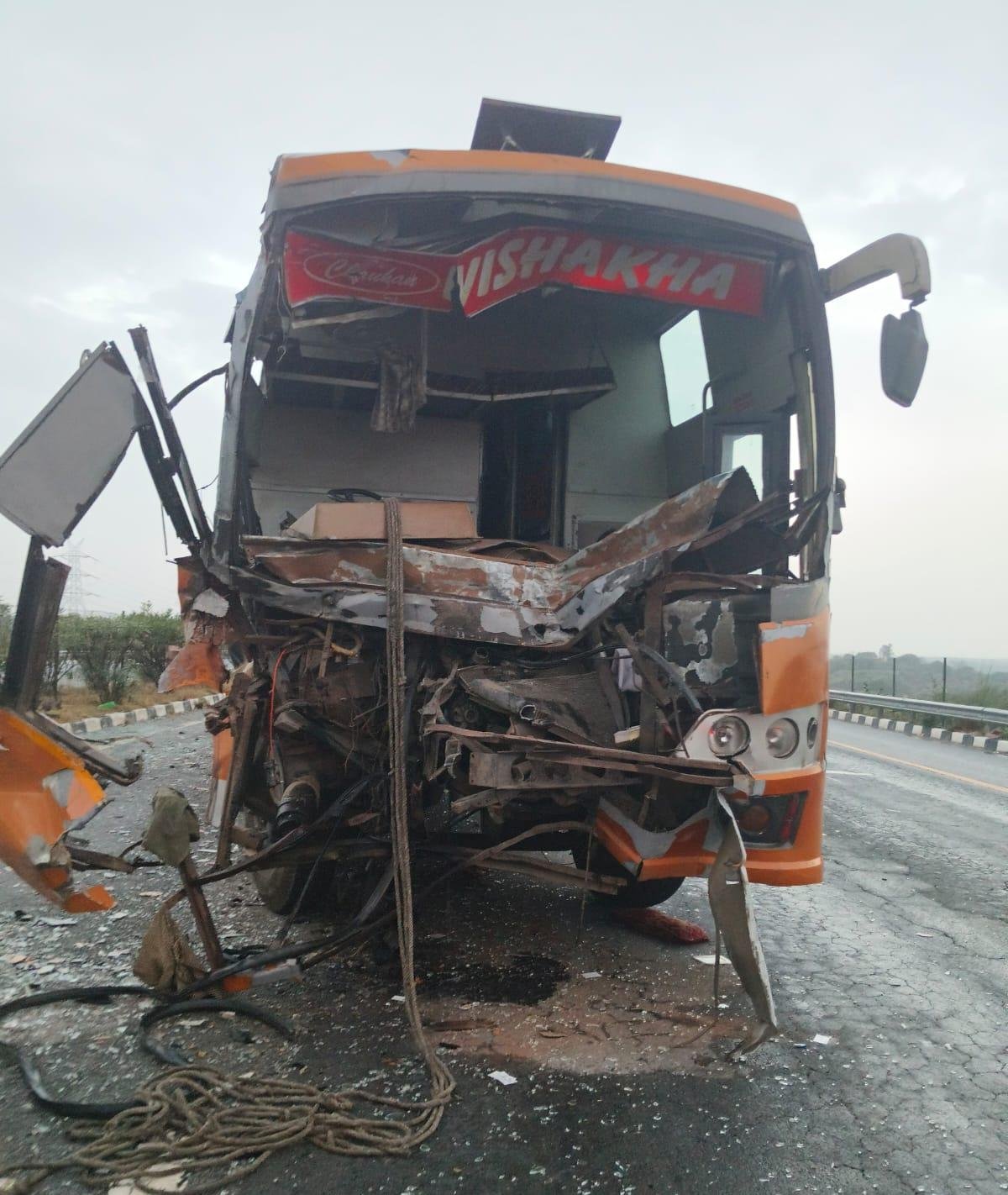 Damaged double decker sleeper bus after crashing into a dumper on Agra Lucknow Expressway in Fatehabad