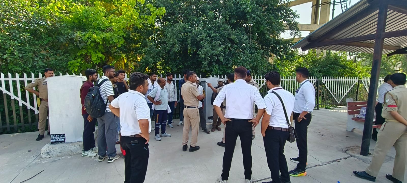 Railway officials and checking staff conducting ticket inspections during a magistrate checking drive at Badh Railway Station.