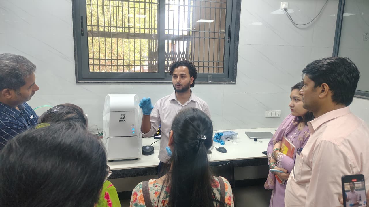 Researchers and students at Dr Bhimrao Ambedkar University during the installation of advanced research laboratory equipment in Agra