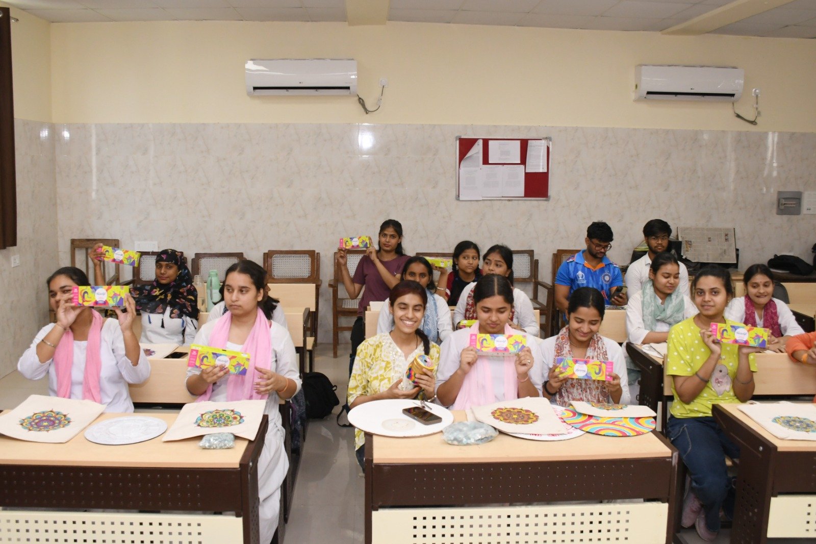 Students participating in a three-day handicraft workshop at Dr. Bhimrao Ambedkar University Agra, learning Mandala Art, Lippan Art, Warli Art and creative handmade craft techniques.