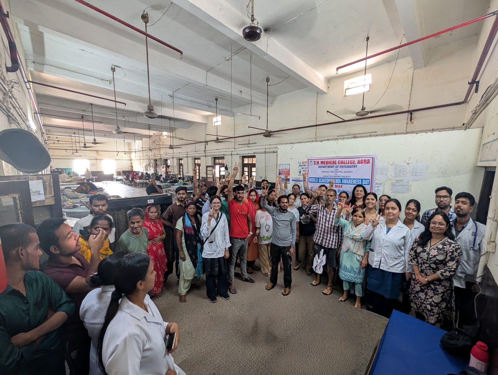 Doctors, patients and healthcare staff participate in the World Schizophrenia Awareness Day awareness program at SN Medical College Agra.