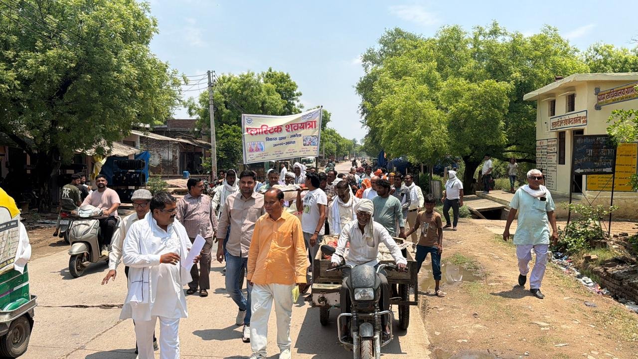 Villagers in Akola conducting a symbolic plastic funeral procession to raise awareness for a plastic-free village campaign and environmental protection