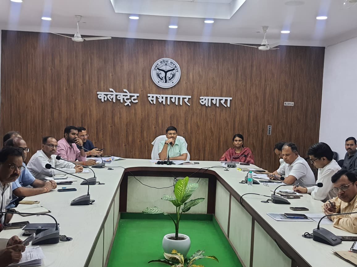 Agra District Magistrate Manish Bansal chairing a review meeting on Civil Terminal project development in Agra with officials from AEA, PWD, NHAI, and other departments