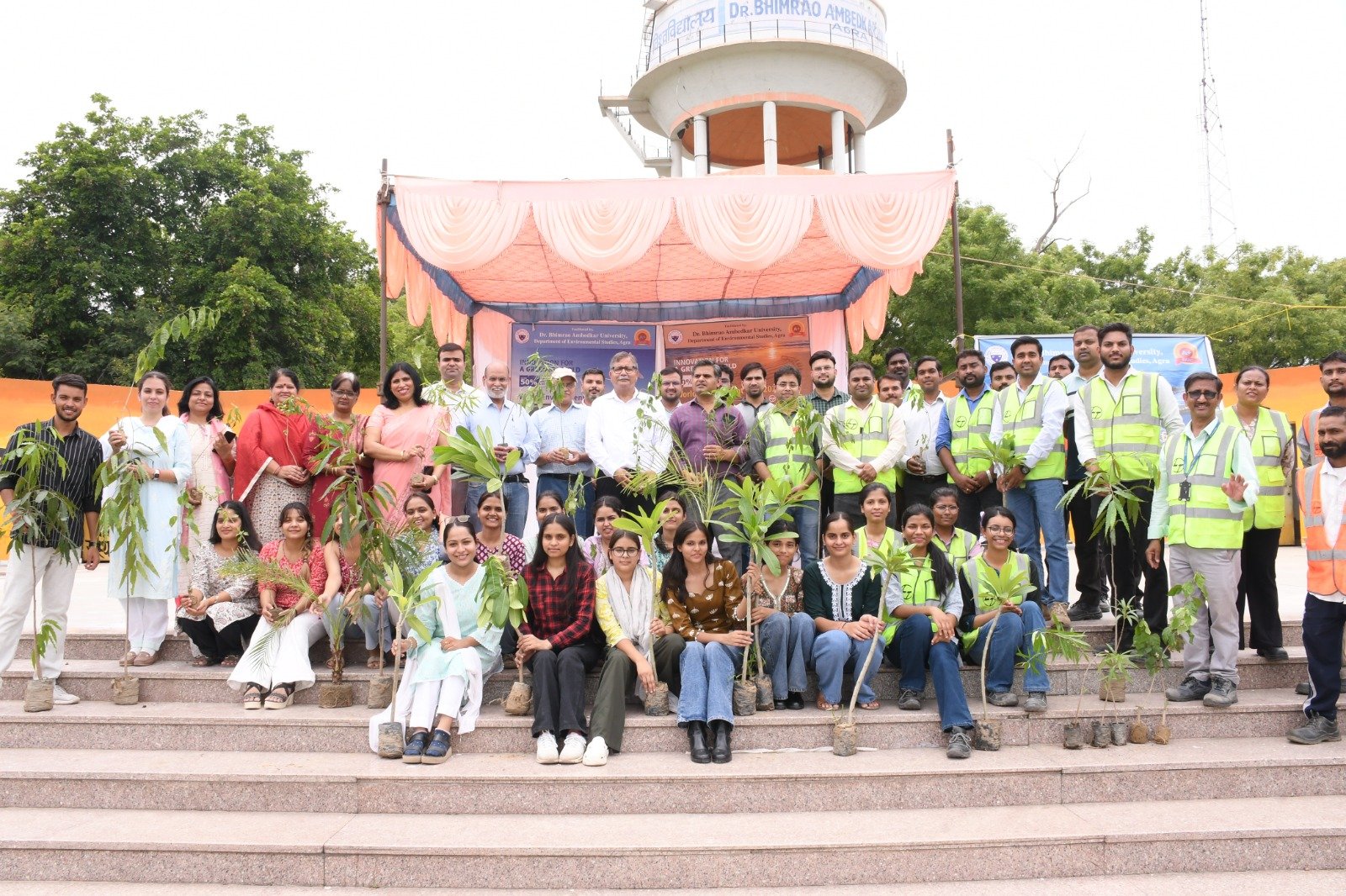 Students, faculty members and university officials participate in a tree plantation drive and environmental awareness rally at Dr. Bhimrao Ambedkar University Agra on World Environment Day 2026