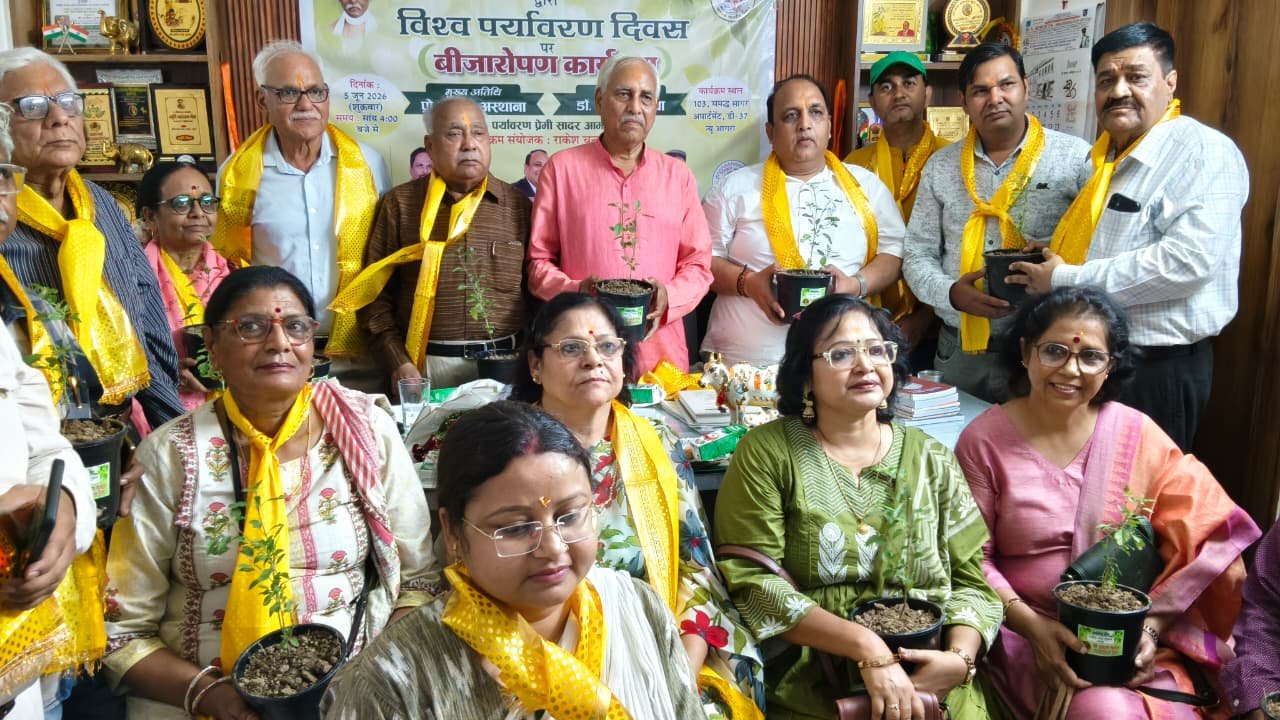 Environmental experts, educators, social workers and environmental activists participating in an environmental pledge and plantation planning meeting on World Environment Day in Agra.