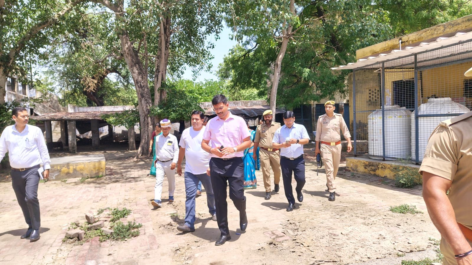 Agra District Magistrate Manish Bansal inspecting examination center arrangements and security preparations for UP Police Recruitment Exam 2025.