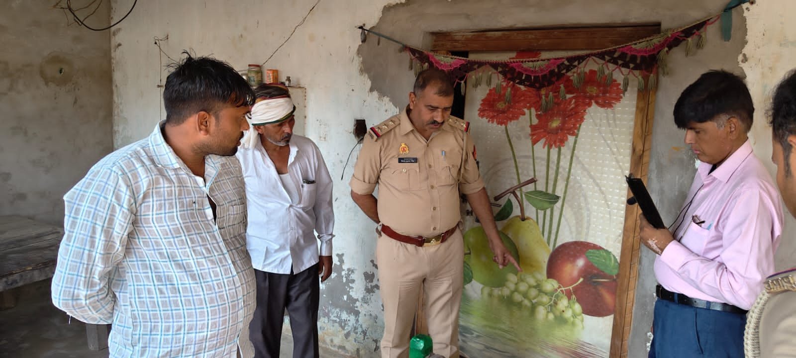 Fatehabad police and forensic team investigating suspicious theft case linked to land dispute in Agra village**