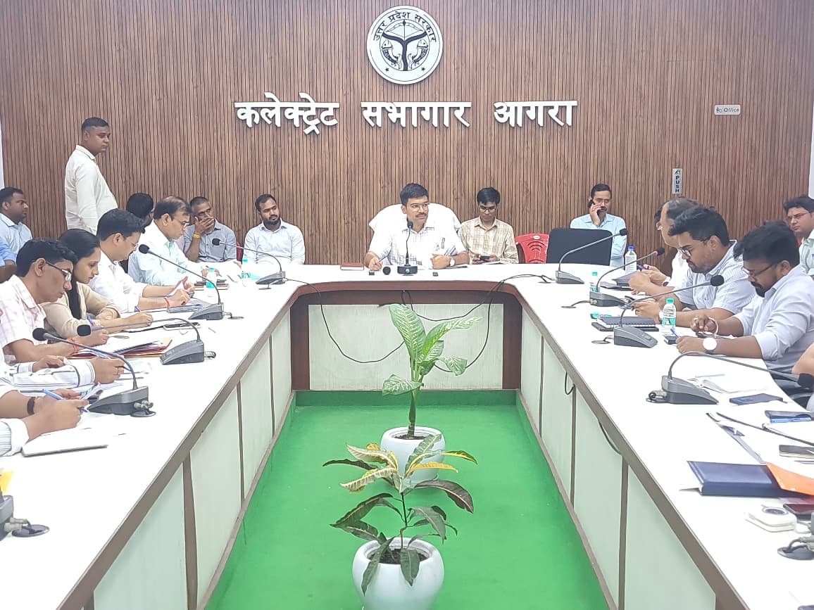 Agra DM Manish Bansal chairing IGRS and CM Helpline review meeting at Collectorate auditorium.
