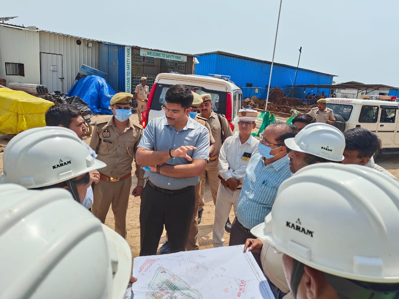 District Magistrate inspecting the Kuberapur bio-remediation and bio-mining waste management project site in Agra, reviewing solid waste processing, door-to-door collection system, and waste-to-energy plant progress.