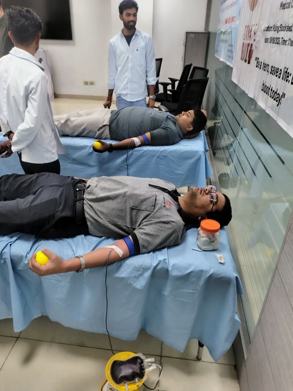 Agra Metro officials and employees participate in a blood donation and free health check-up camp organized at the metro depot.