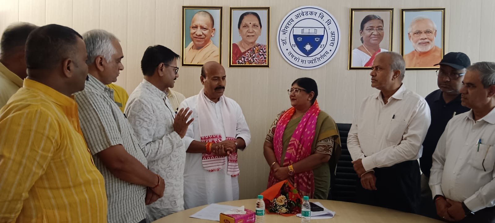 Central Minister Dr. Virendra Kumar honoring Vice Chancellor Prof. Ashu Rani during an academic excellence event at Dr. Bhimrao Ambedkar University, Agra.