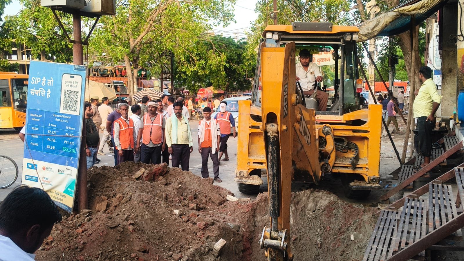 Drain construction work begins near the government bus stand in Fatehabad to address long-standing waterlogging and drainage issues.