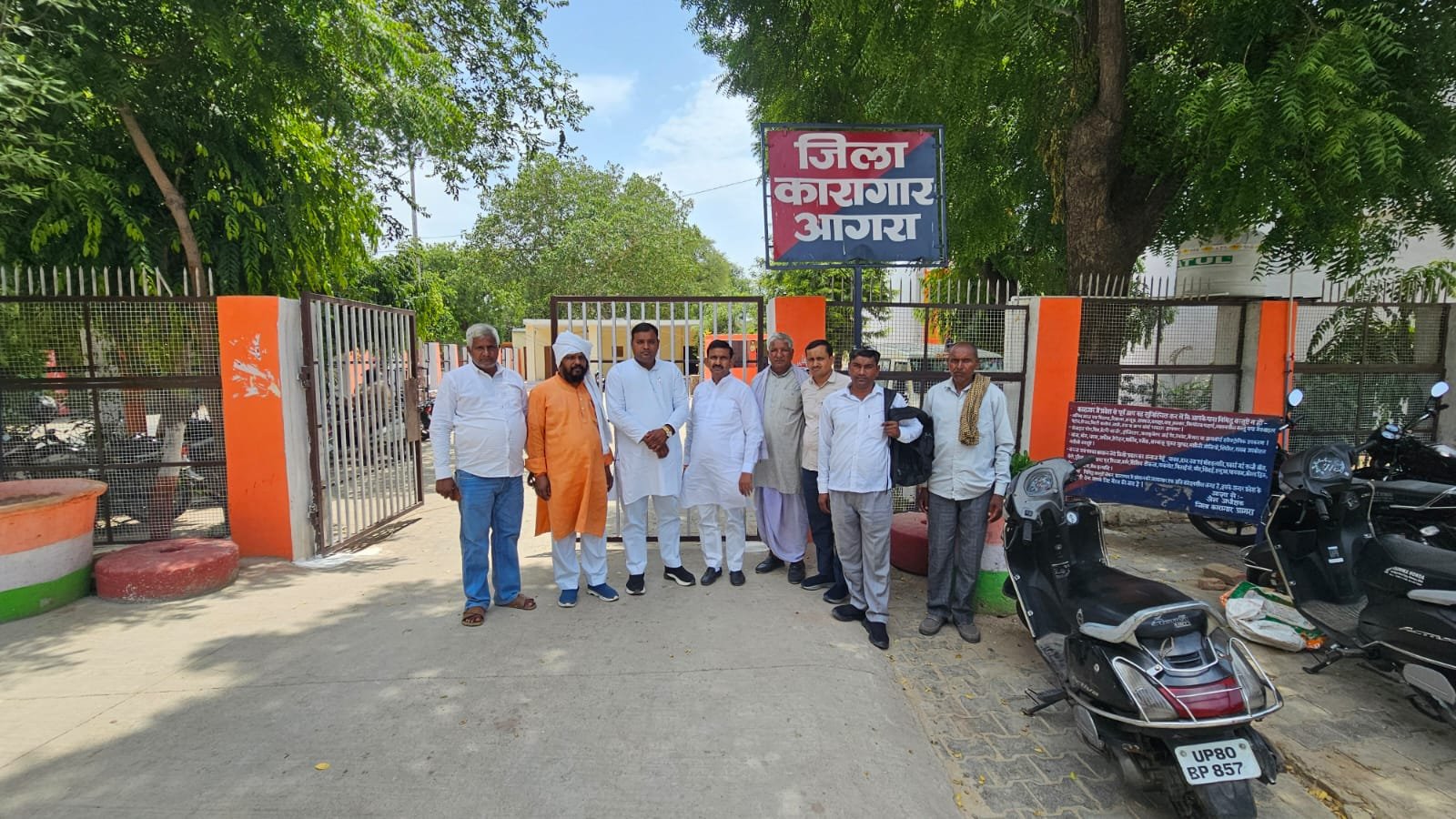 Former MLA Jitendra Verma meeting jailed villagers and discussing their welfare at the district jail in Agra.