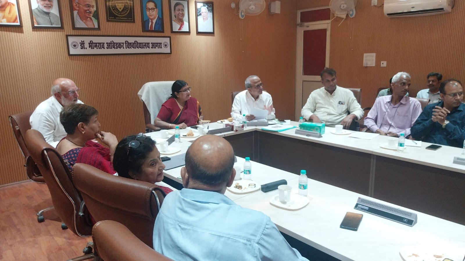 Vice Chancellor Prof. Ashu Rani reviews preparations for the Dr. Bhimrao Ambedkar University centenary exhibition during a committee meeting in Agra.