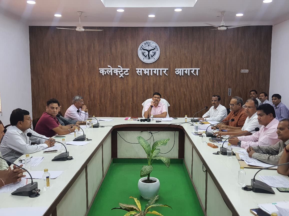 District Magistrate Manish Bansal presiding over the Vyapar Bandhu meeting at the Collectorate Auditorium in Agra.