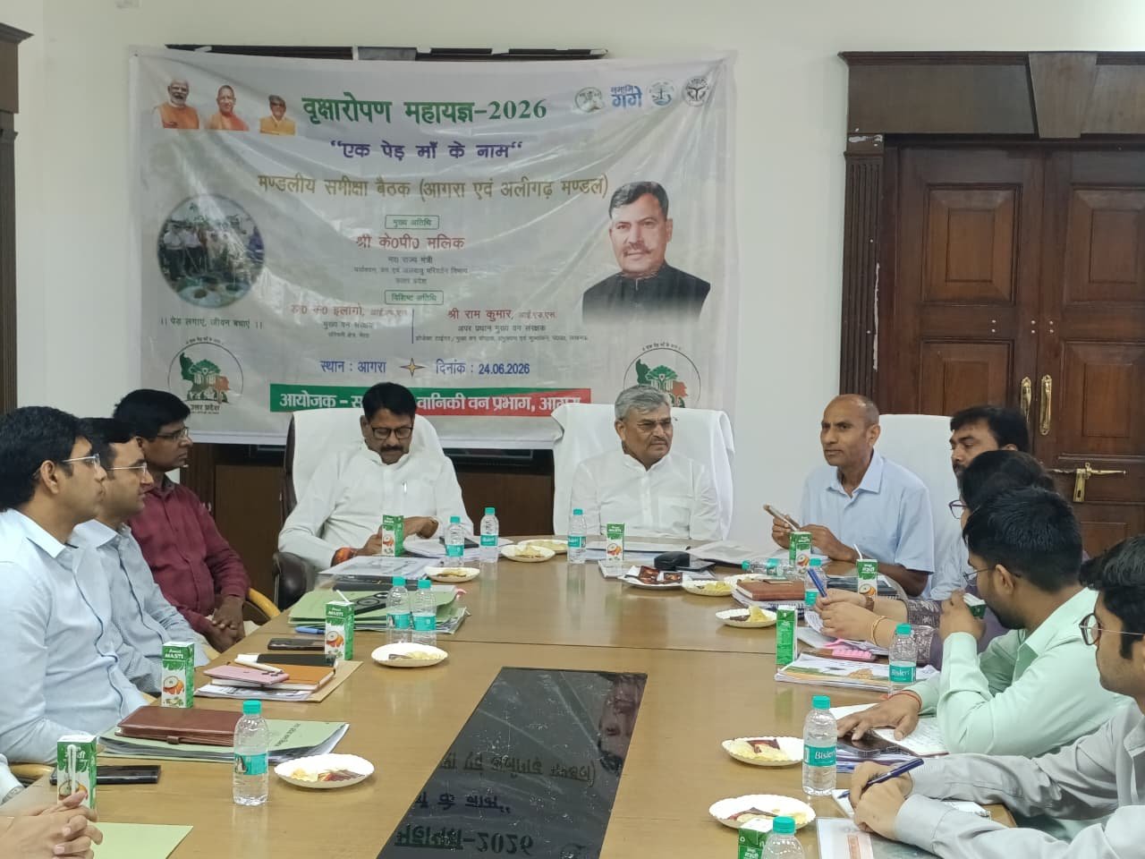 Uttar Pradesh Minister K. P. Malik chairs a review meeting on the 2026 tree plantation drive with forest officials from Agra and Aligarh divisions at Agra Circuit House.